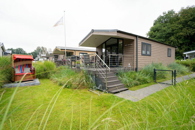 Ferienhaus in Scharbeutz - Casa del Mar Scharbeutz - Sauna kostenlos - 1 kleiner Hund willkommen - umz&auml;unter Garten - Bild 2