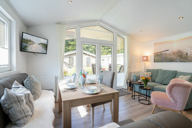 Ferienhaus in Scharbeutz - Casa del Mar Scharbeutz - Sauna kostenlos - 1 kleiner Hund willkommen - umz&auml;unter Garten - Bild 5