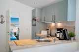 Ferienhaus in Scharbeutz - Casa del Mar Scharbeutz - Sauna kostenlos - 1 kleiner Hund willkommen - umz&auml;unter Garten - Bild 8