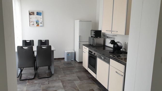 Ferienwohnung in Börgerende - Appartement 2 - Dünenblick - Küche mit Ausgang Terrasse