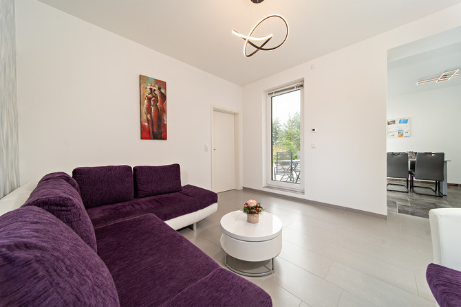 Ferienwohnung in Börgerende - Appartement 2 - Dünenblick - WZ mit Ausgang Terrasse