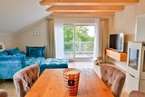 Ferienwohnung in Sellin - Ferienwohnung Weitblick mit gro&szlig;em Balkon, Sauna, Kaminofen im OG - Bild 1